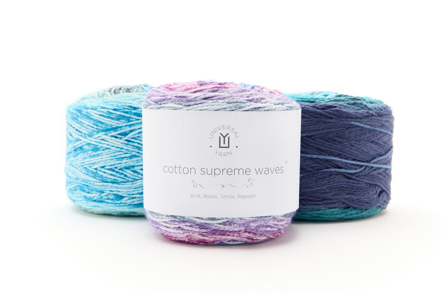 Three skeins of yarn with a label on a white background