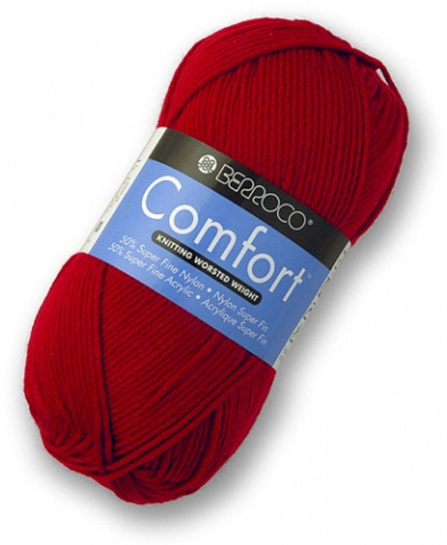 A skein of Berroco Comfort yarn in red color, displayed with the brand label visible.