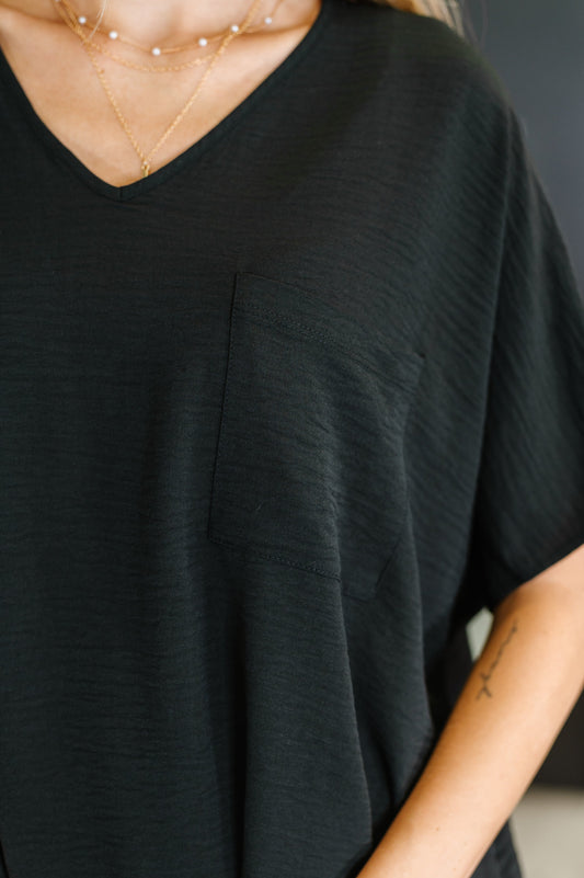 Top Coastal Ease con cuello en V en negro