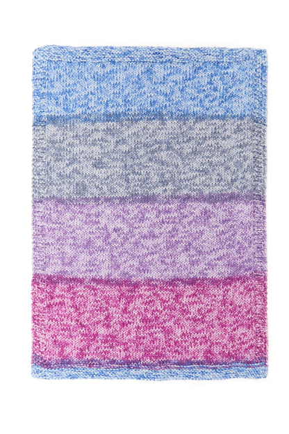 Colorful striped fabric with blue, gray, and pink sections on a white background