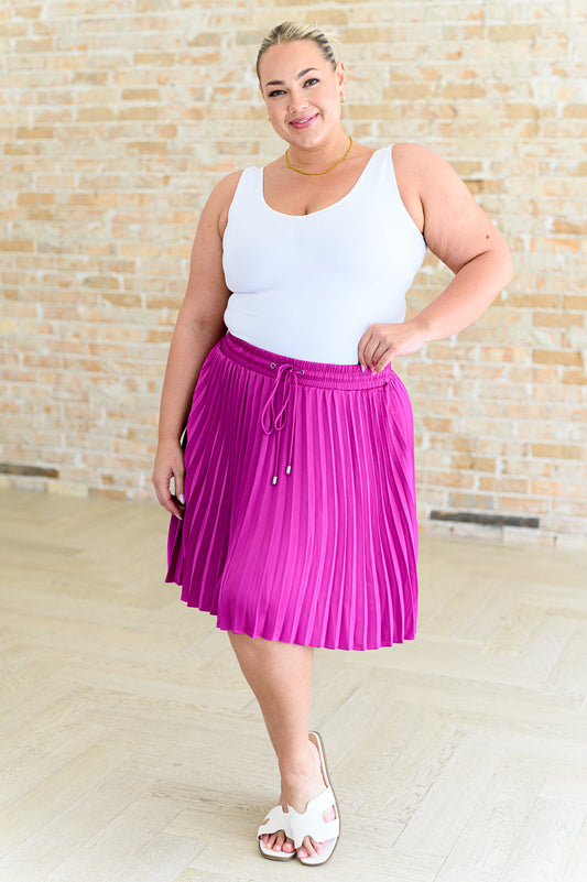 Falda plisada Just a Flirt en color magenta 