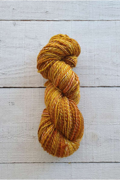 Photo of a skein of Manos del Uruguay Marla in colour Gold