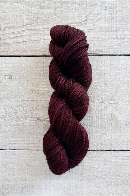 Photo of a skein of Manos del Uruguay Sami in colour Bing Cherry